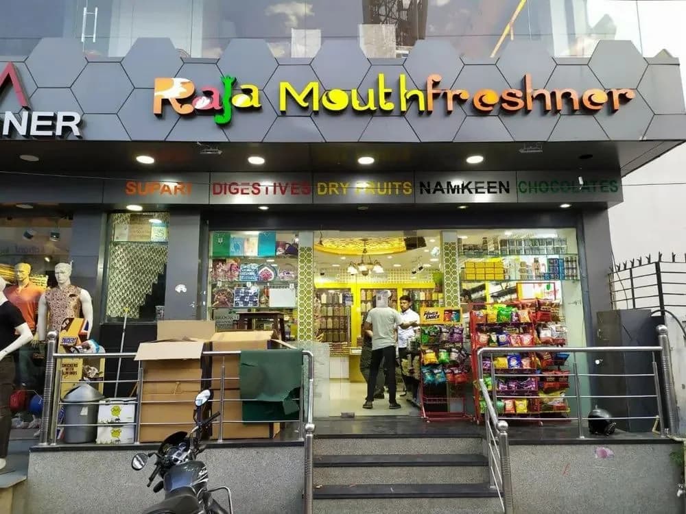 Illuminated lettering on the fascia of a retail shopfront, signage work by iMad, Jaipur