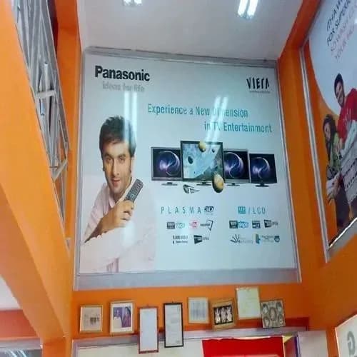 Printed wall graphic installed inside a store, retail branding by iMad, Jaipur
