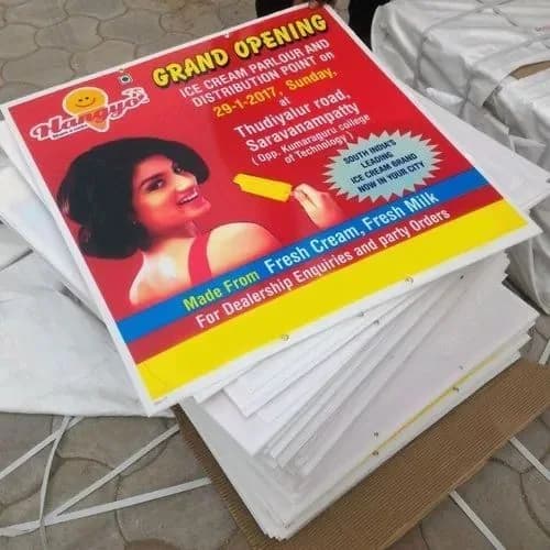 Stack of printed promotional flyers, printing work by iMad, Jaipur