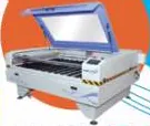 Flatbed laser engraving machine with its lid open